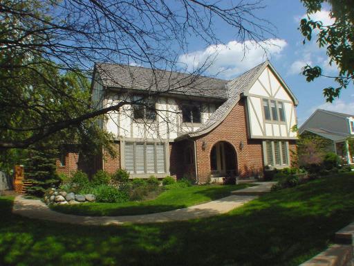 694 South River Road Naperville, IL 60540 - Photo 1 of 1 a front view of a house with a garden