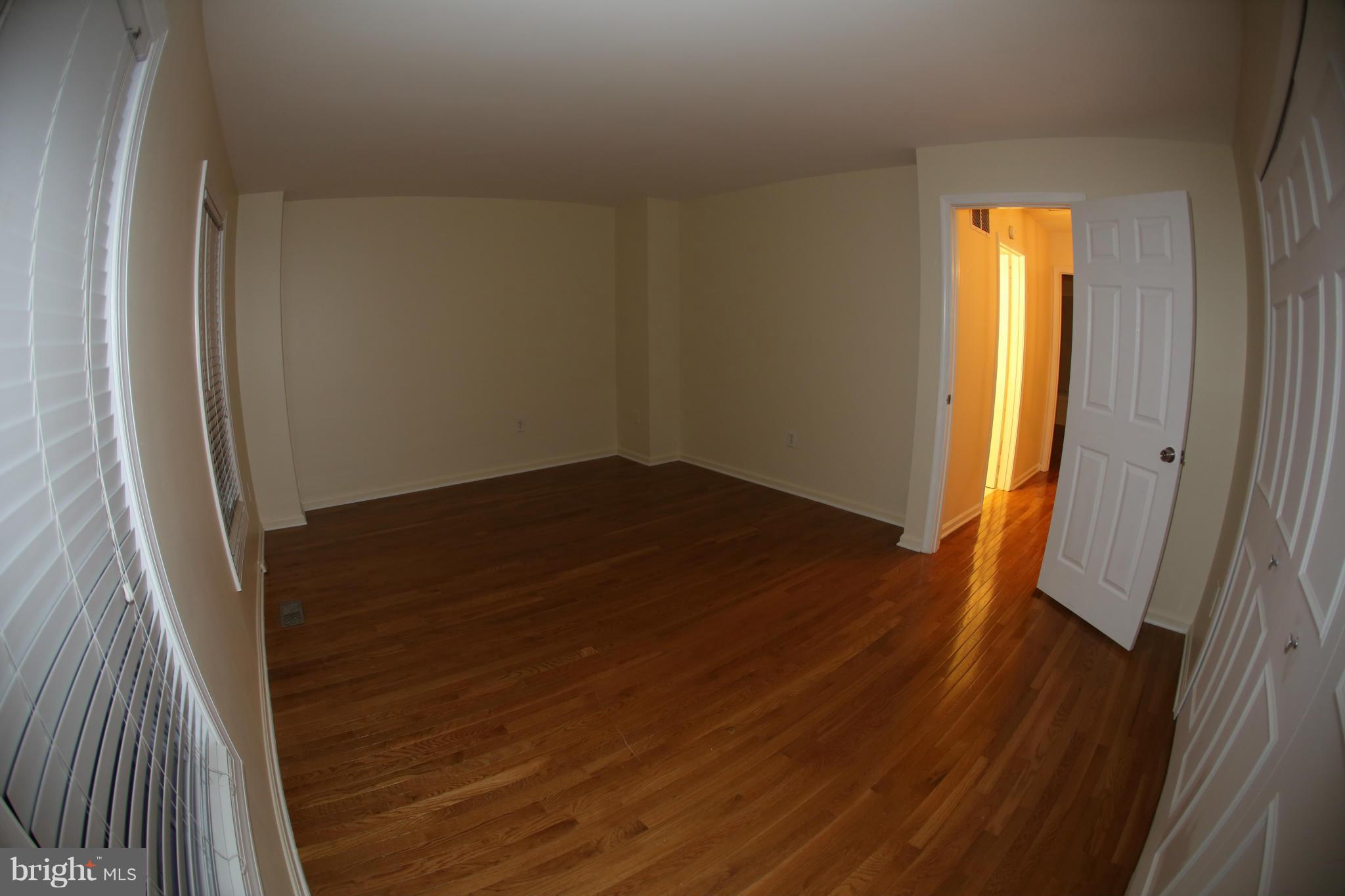 8046 Felecity Court Springfield, VA 22153 - Photo 11 of 26 wooden floor in an empty room