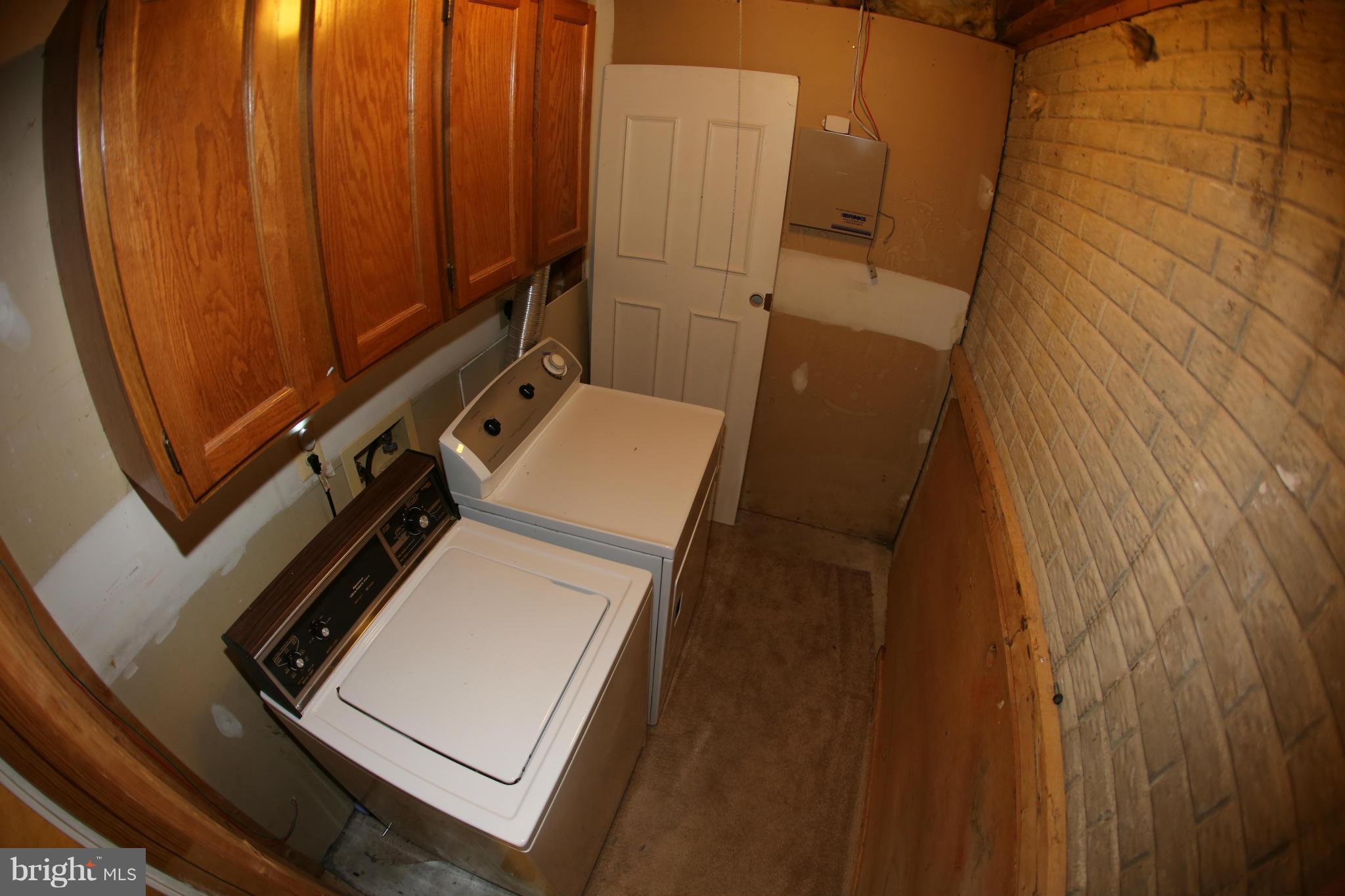 8046 Felecity Court Springfield, VA 22153 - Photo 20 of 26 a utility room with dryer and washer