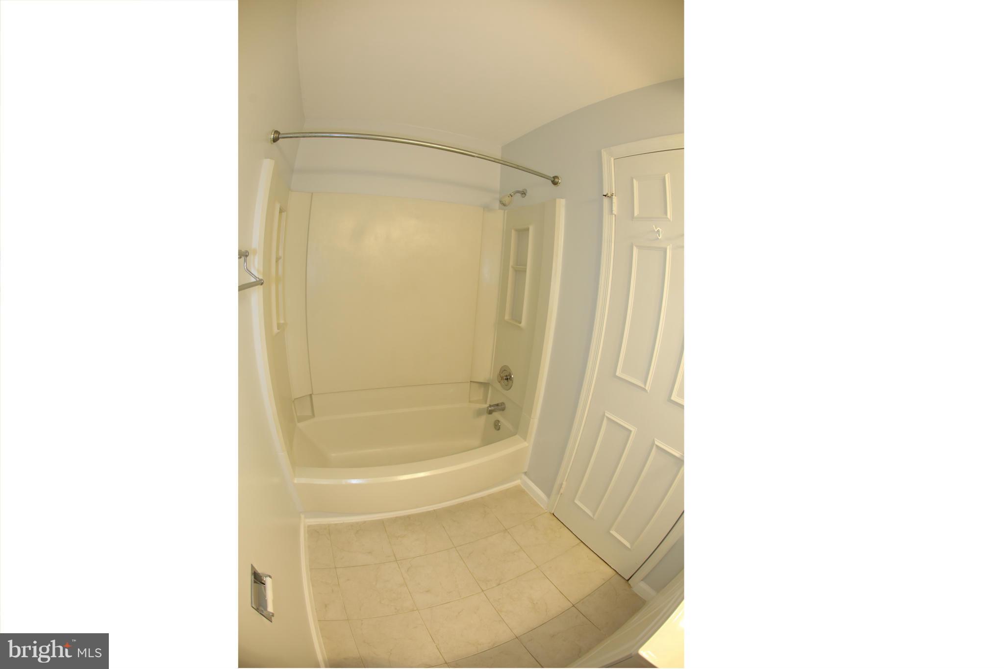 8046 Felecity Court Springfield, VA 22153 - Photo 24 of 26 a bathroom with a shower