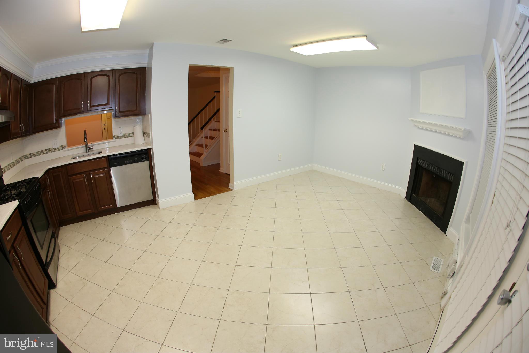 8046 Felecity Court Springfield, VA 22153 - Photo 8 of 26 a bedroom with a bed and a flat screen tv