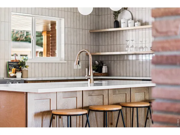a kitchen with a sink and a cabinets
