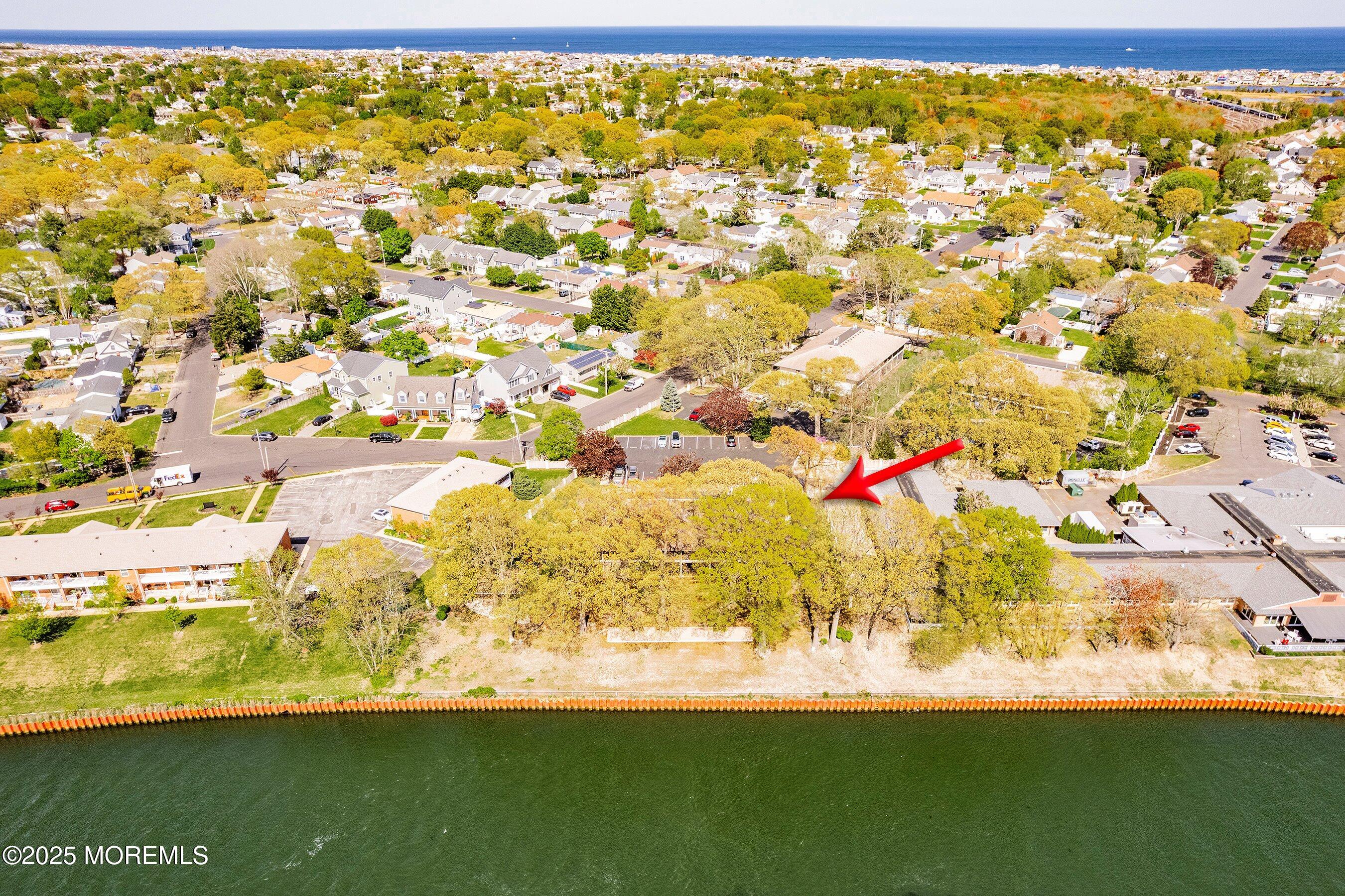 1501 Hulse Road, Unit 18 Point Pleasant, NJ 08742 - Photo 30 of 40 45-Back Aerial with arrow