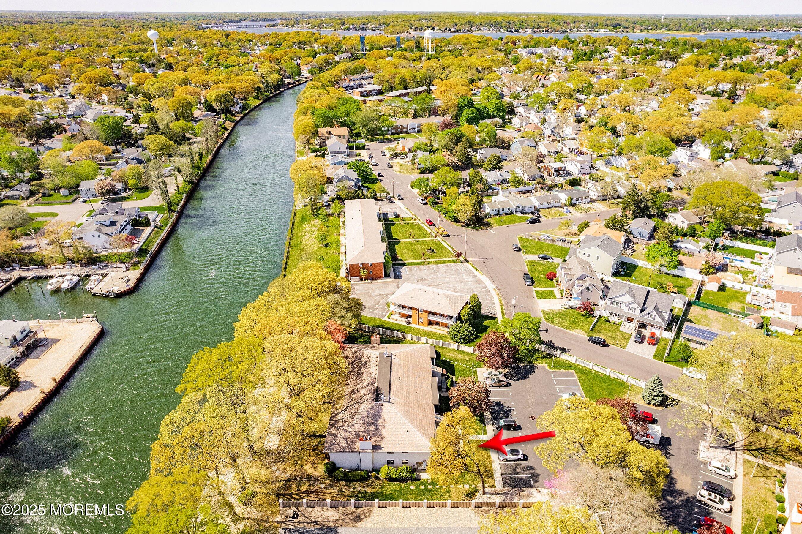 1501 Hulse Road, Unit 18 Point Pleasant, NJ 08742 - Photo 5 of 40 05-Left Aerial with arrow