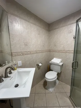 a bathroom with a sink and a toilet