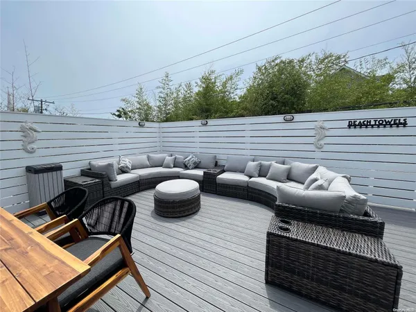 a view of a roof deck with couches