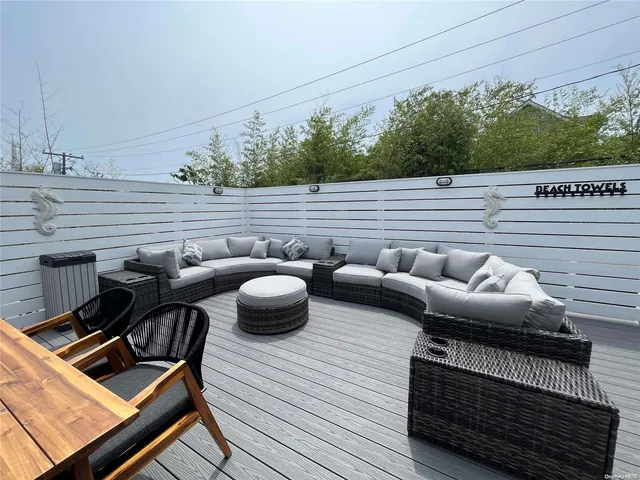 a view of a roof deck with couches