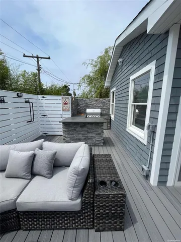 a balcony with furniture