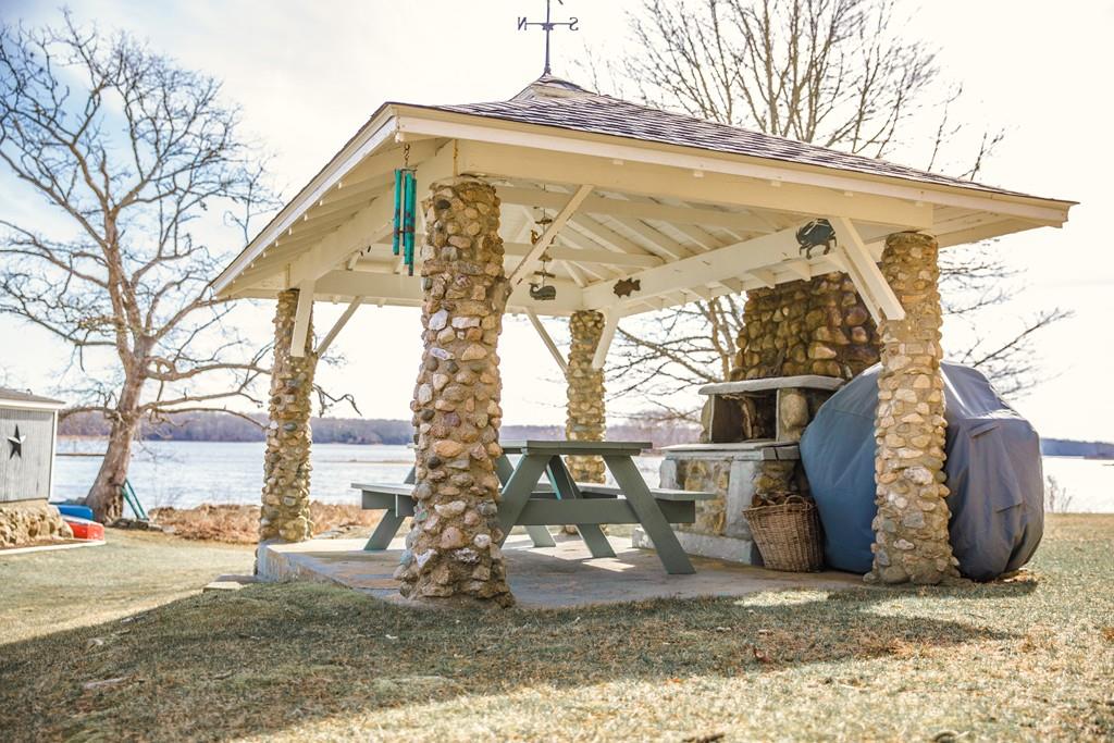 166 River Road Westport, MA 02790 - Photo 12 of 30 a view of a wooden house with a outdoor space