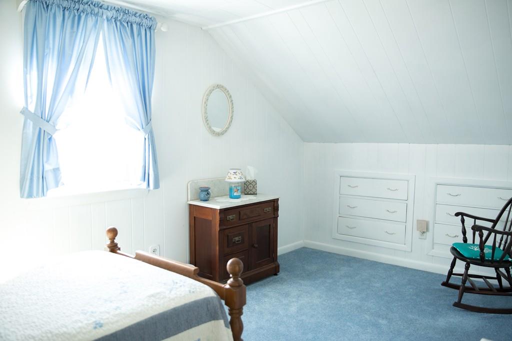 166 River Road Westport, MA 02790 - Photo 22 of 30 a bedroom with a bed and a window