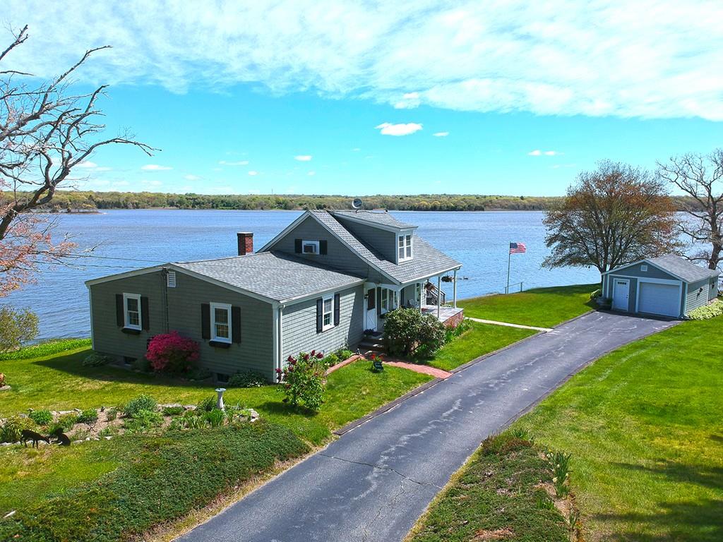 166 River Road Westport, MA 02790 - Photo 24 of 30 a aerial view of a house with a yard and potted plants