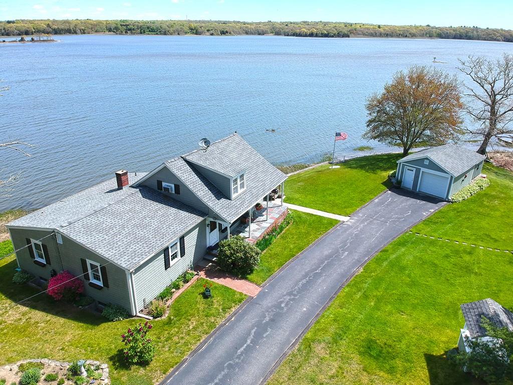 166 River Road Westport, MA 02790 - Photo 25 of 30 a aerial view of a house with a yard and lake view