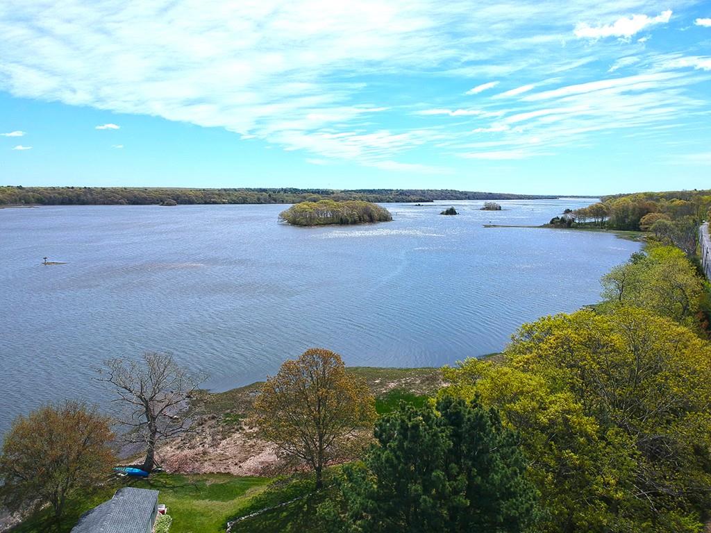 166 River Road Westport, MA 02790 - Photo 26 of 30 a view of a lake in middle of the forest