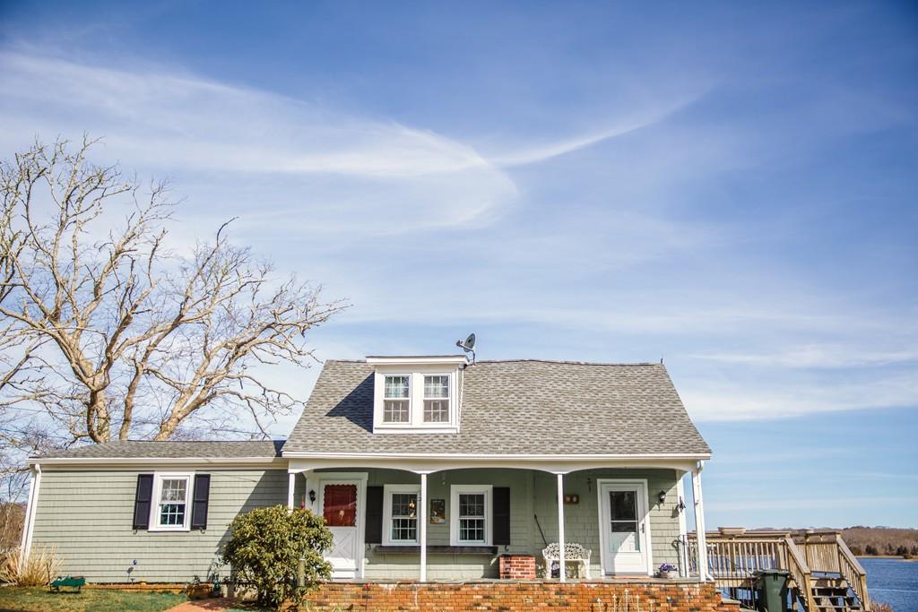 166 River Road Westport, MA 02790 - Photo 10 of 30 front view of house with a street