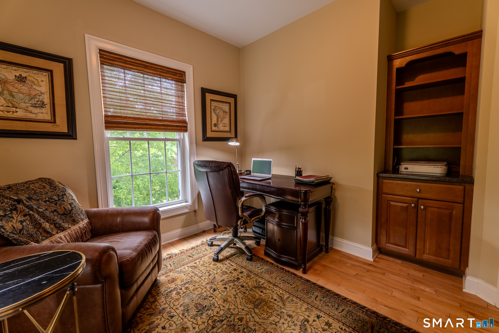 4 Ortense Road Wallingford, CT 06492 - Photo 15 of 33 a view of a workspace with furniture and a window