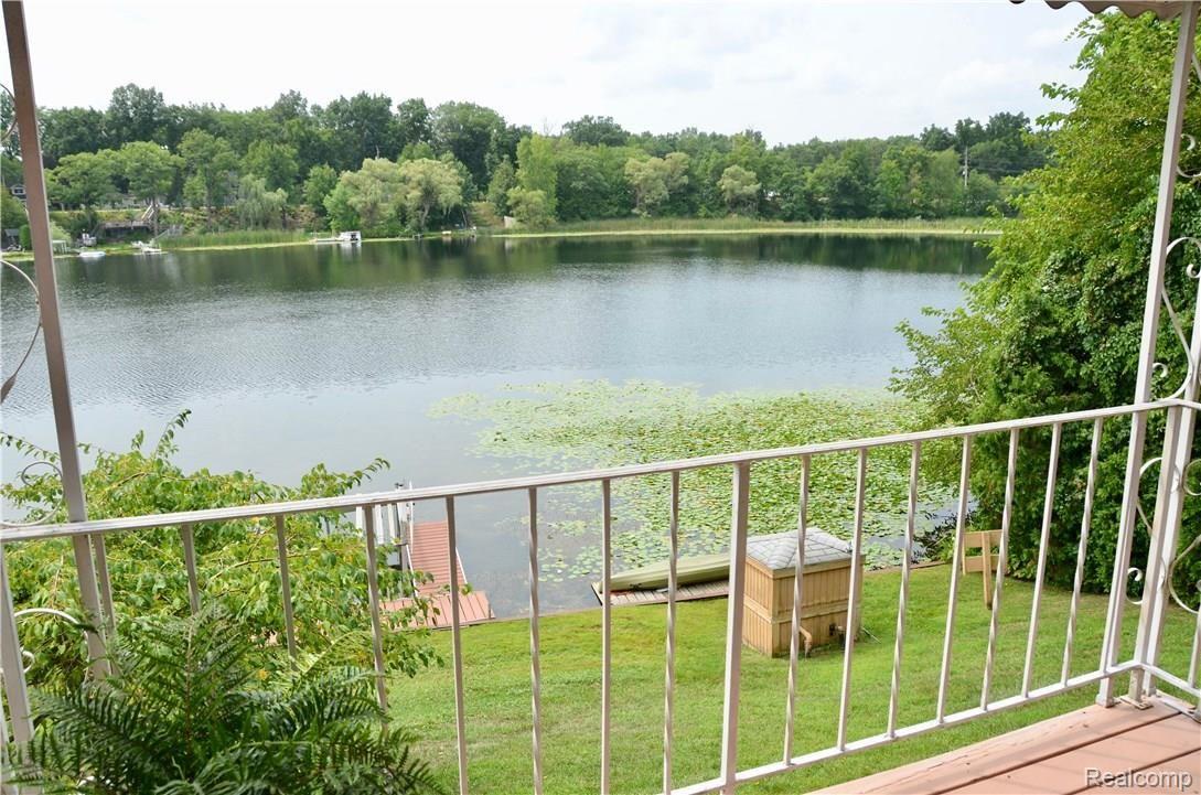 6681 Andersonville Road, Unit 28 Clarkston, MI 48346 - Photo 8 of 22 Elevated View from your Great Room Covered Porch