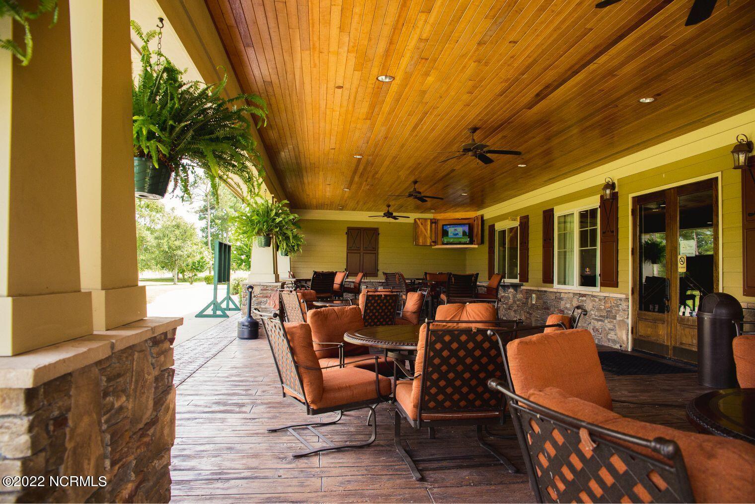 9219 Oldfield Road Calabash, NC 28467 - Photo 33 of 36 Crow-Creek-Clubhouse-patio