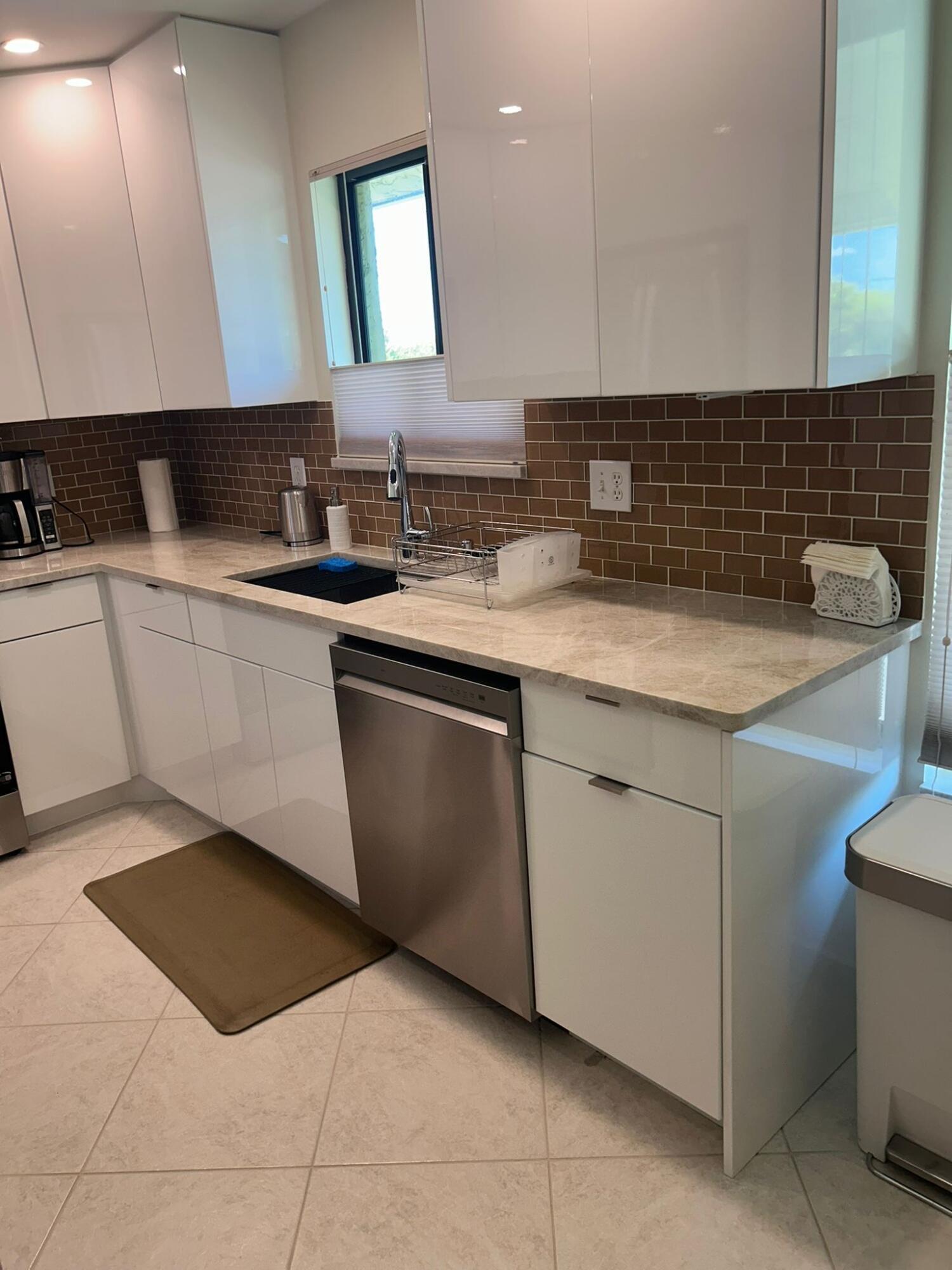 159 Northwest 70th Street, Unit 402 Boca Raton, FL 33487 - Photo 3 of 28 d085cd57-e677-41bf-8388-5ba2d934c326