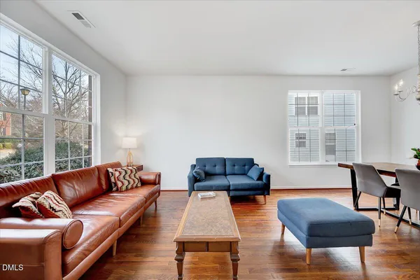 a bedroom with a bed and a table