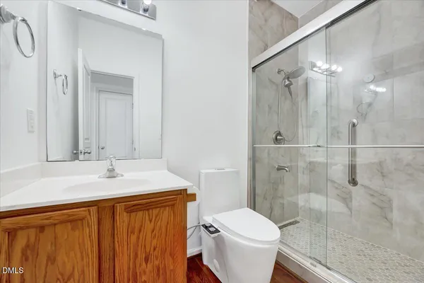 a view of a dining room with furniture and window