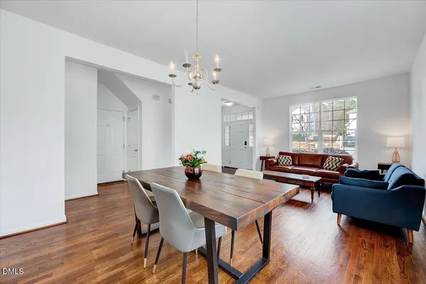 a kitchen with stainless steel appliances a refrigerator sink and stove