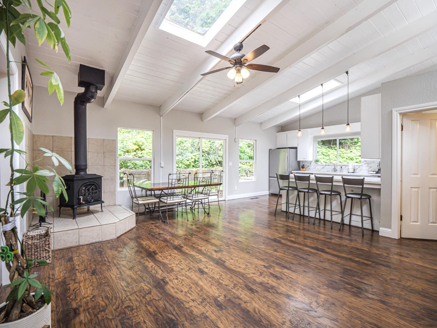 757 Cathedral Drive Aptos, CA 95003 - Photo 12 of 32 a living room with furniture and a large window