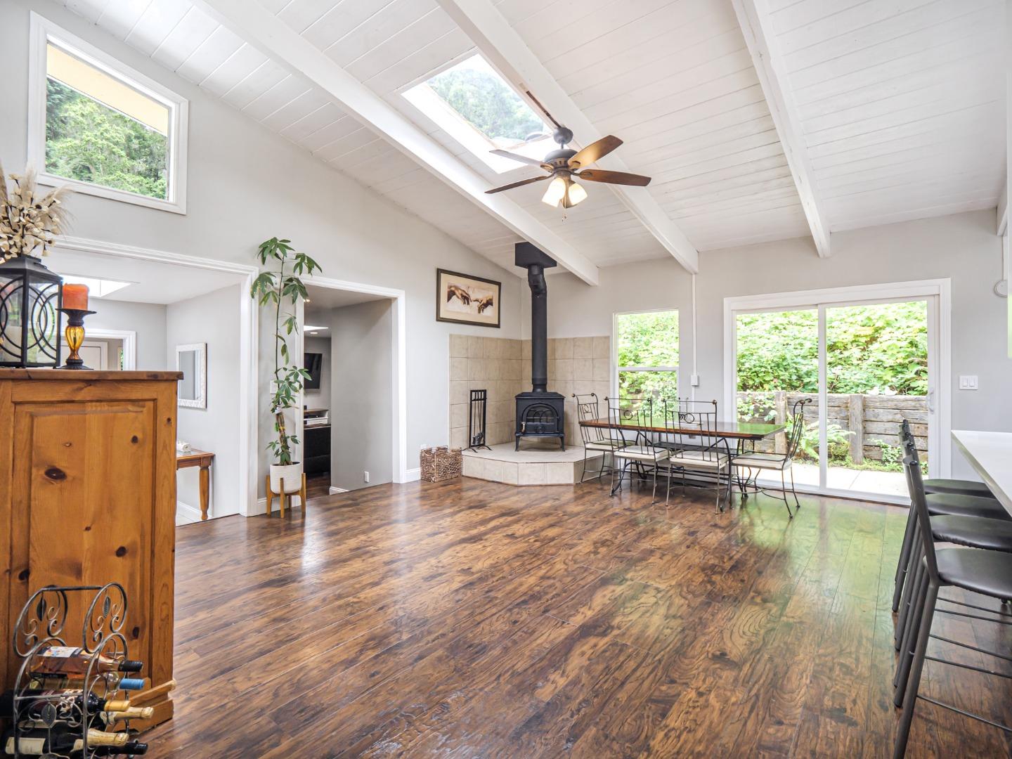757 Cathedral Drive Aptos, CA 95003 - Photo 13 of 32 a living room with furniture and a large window
