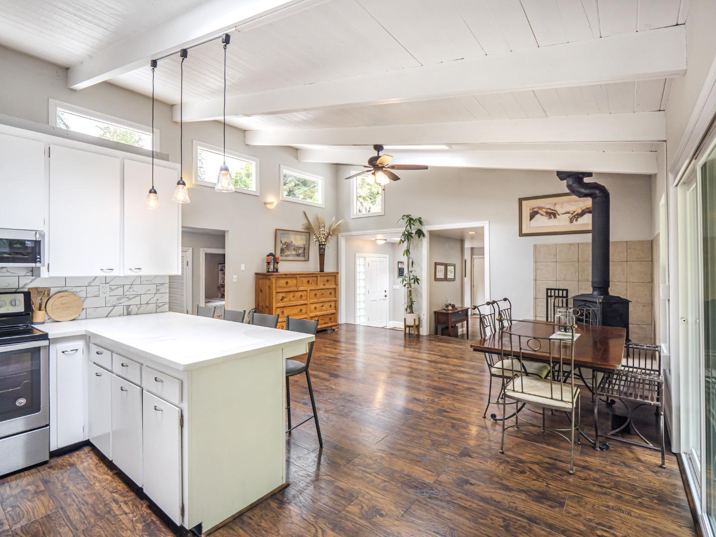 757 Cathedral Drive Aptos, CA 95003 - Photo 19 of 32 a large white kitchen with lots of counter space and furniture