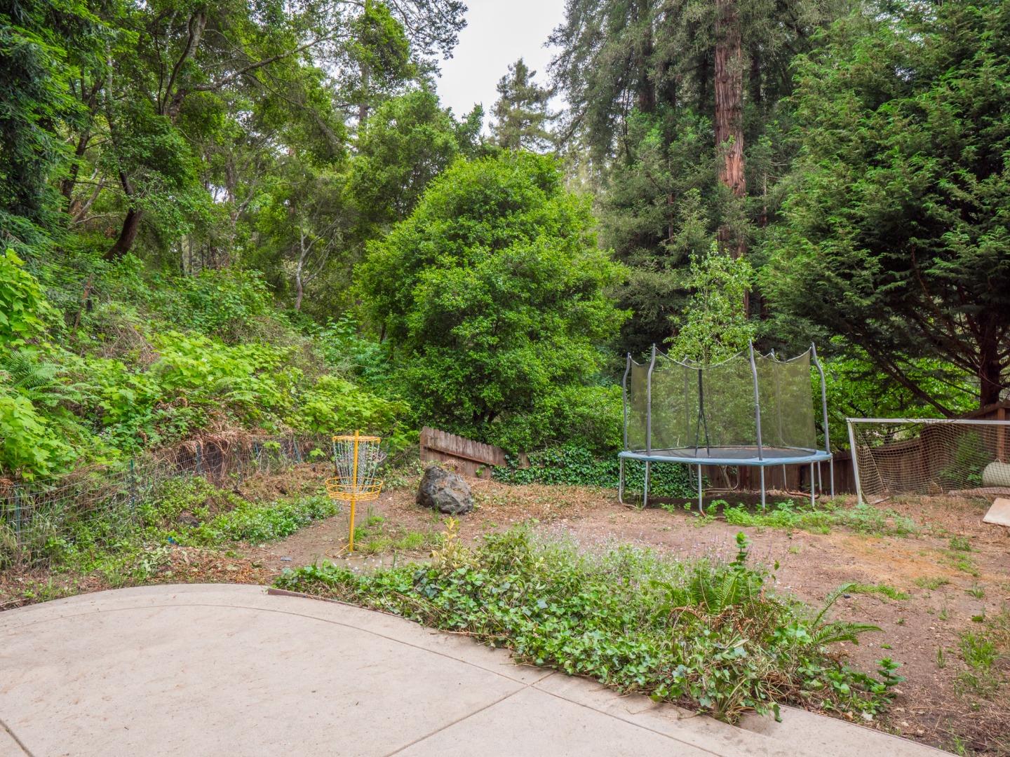 757 Cathedral Drive Aptos, CA 95003 - Photo 29 of 32 a front view of a house with a yard