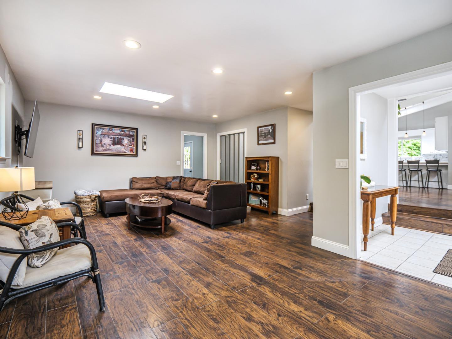 757 Cathedral Drive Aptos, CA 95003 - Photo 7 of 32 a living room with furniture and a wooden floor
