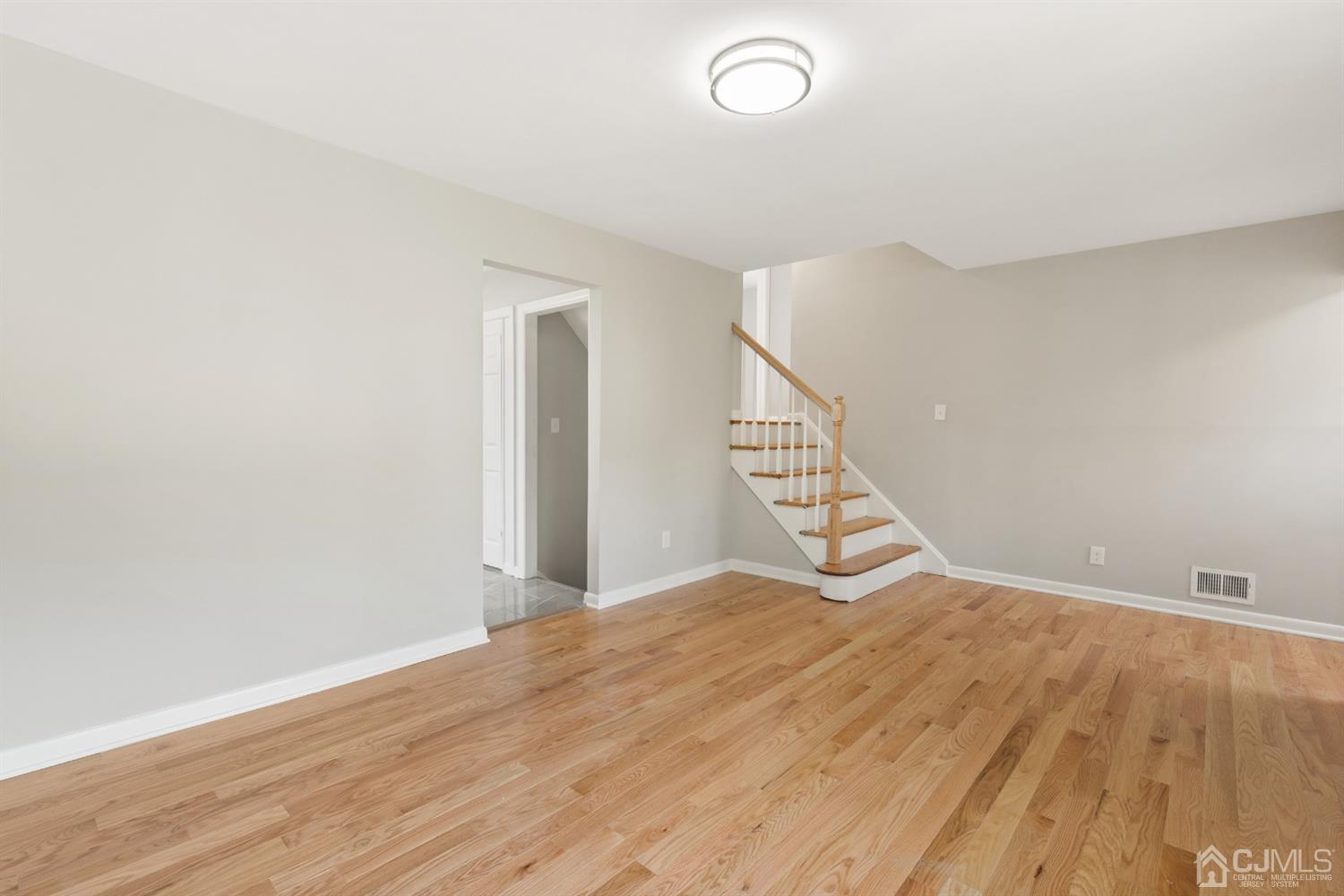 556 Chain O' Hills Road Colonia, NJ 07067 - Photo 17 of 24 a view of empty room with wooden floor