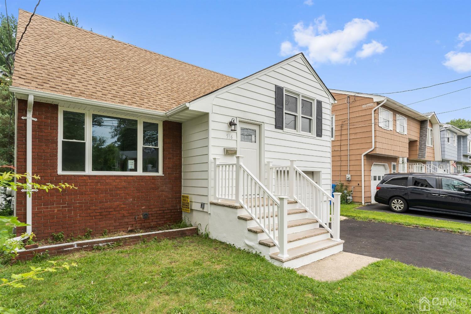 556 Chain O' Hills Road Colonia, NJ 07067 - Photo 3 of 24 a view of front a house with a yard