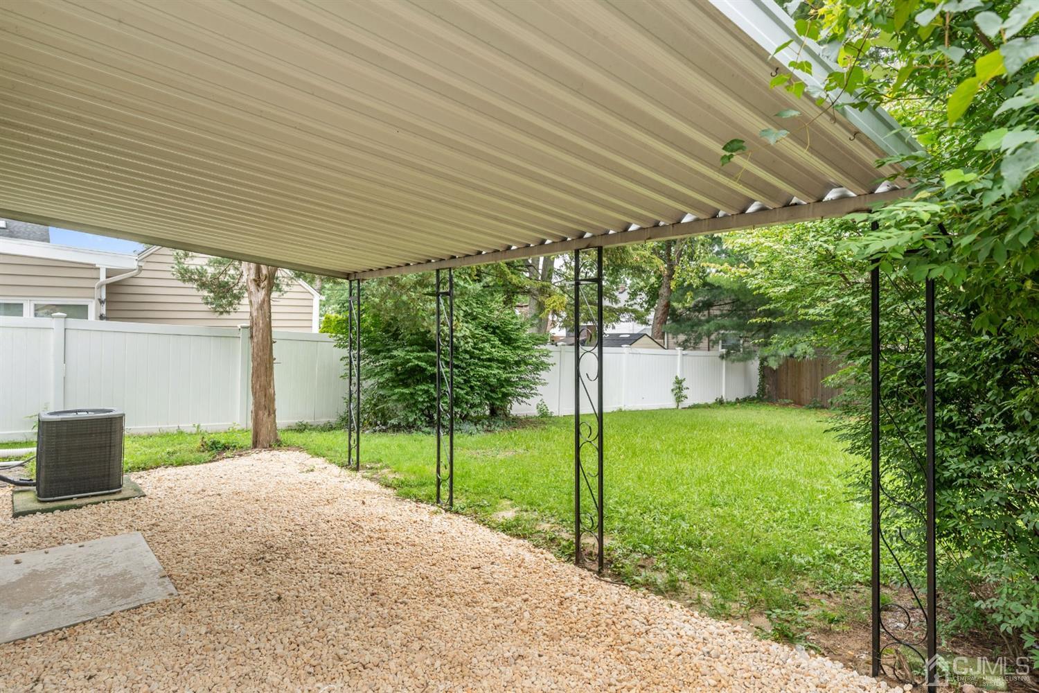 556 Chain O' Hills Road Colonia, NJ 07067 - Photo 24 of 24 a house view with a garden space