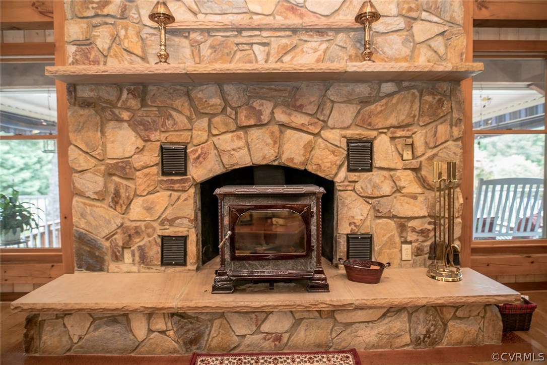 14101 Happy Hill Road Chester, VA 23831 - Photo 28 of 50 Stone Fireplace with a Tennessee River Stone Heart