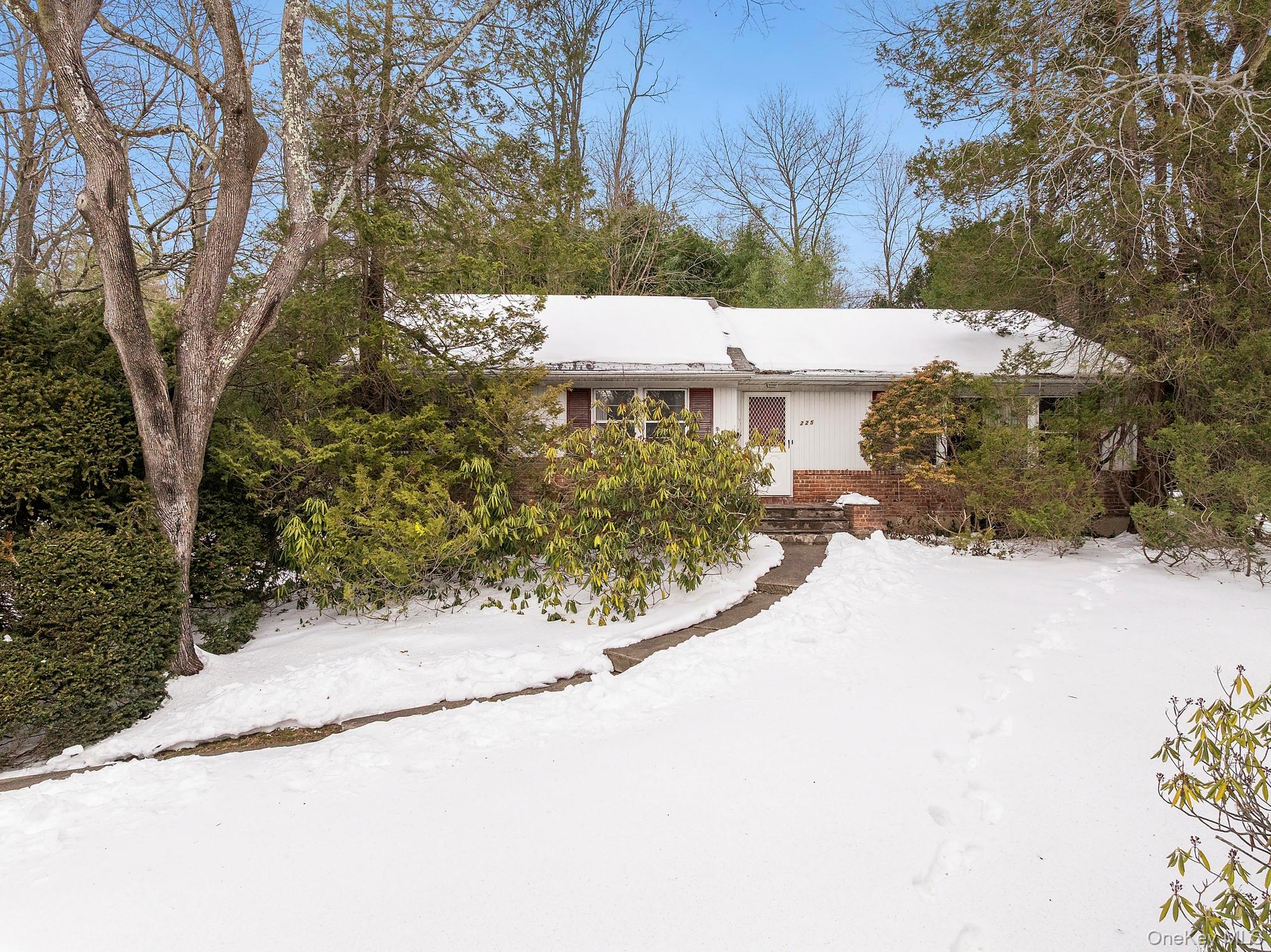 225 Port Washington Boulevard Port Washington, NY 11050 - Photo 1 of 1 a view of a house with a yard