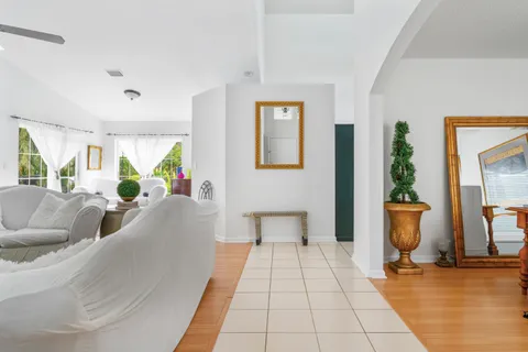 a living room with furniture and a rug