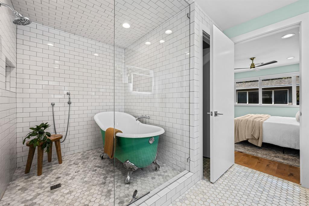 2547 Wentworth Street Dallas, TX 75211 - Photo 11 of 22 a bathroom with a sink and a mirror