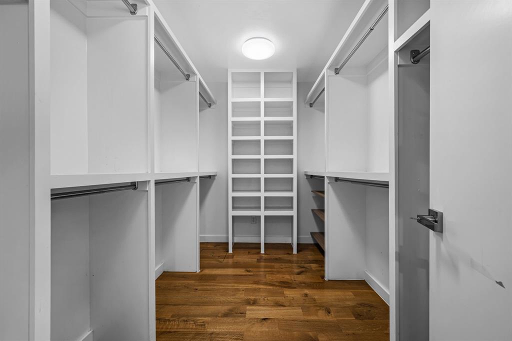 2547 Wentworth Street Dallas, TX 75211 - Photo 12 of 22 a view of walk in closet with empty racks