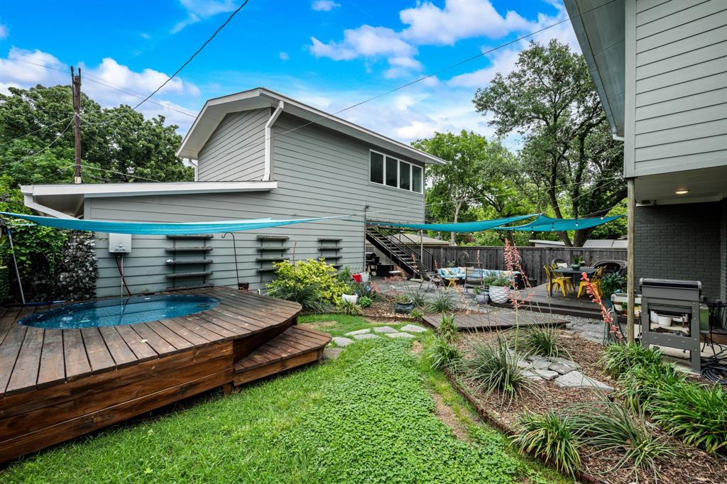 2547 Wentworth Street Dallas, TX 75211 - Photo 22 of 22 a view of a house with backyard and sitting area