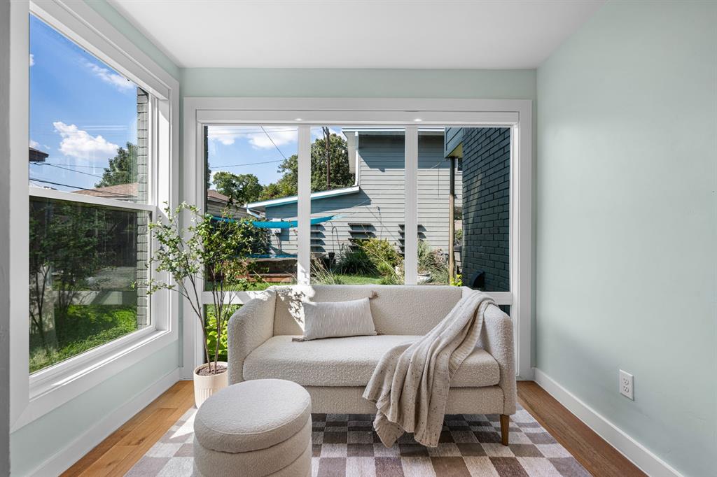 2547 Wentworth Street Dallas, TX 75211 - Photo 6 of 22 a living room with furniture and a large window