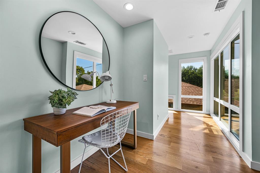 2547 Wentworth Street Dallas, TX 75211 - Photo 8 of 22 a living room with furniture and a mirror