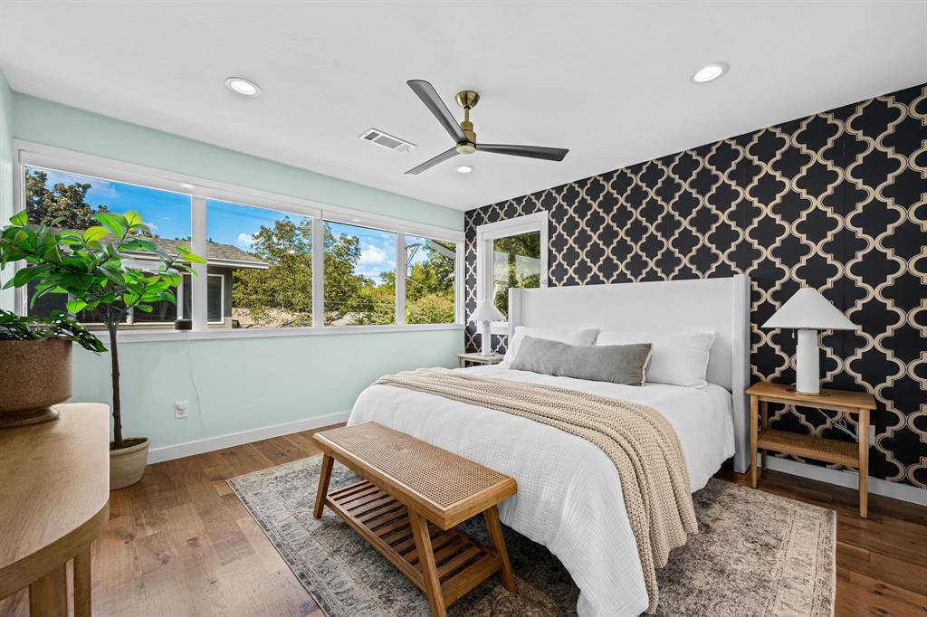 2547 Wentworth Street Dallas, TX 75211 - Photo 9 of 22 a bedroom with bed and window