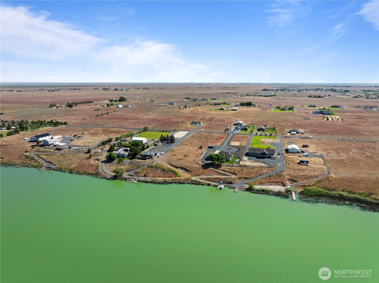 7416 Stonecrest Road Northeast Moses Lake, WA 98837 - Photo 8 of 12 an aerial view of a house with a yard