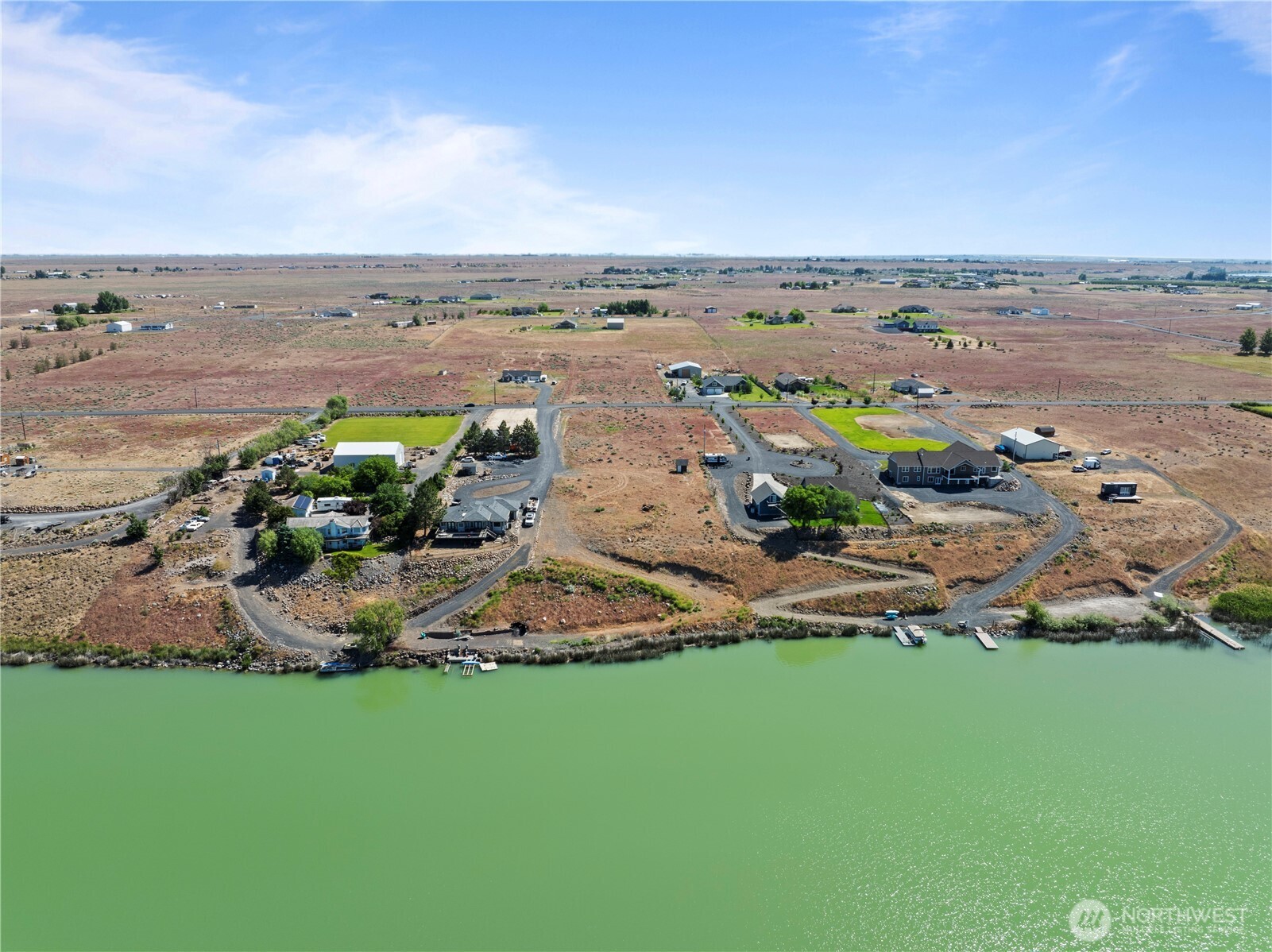 7416 Stonecrest Road Northeast Moses Lake, WA 98837 - Photo 9 of 12 an aerial view of multiple house with outdoor space