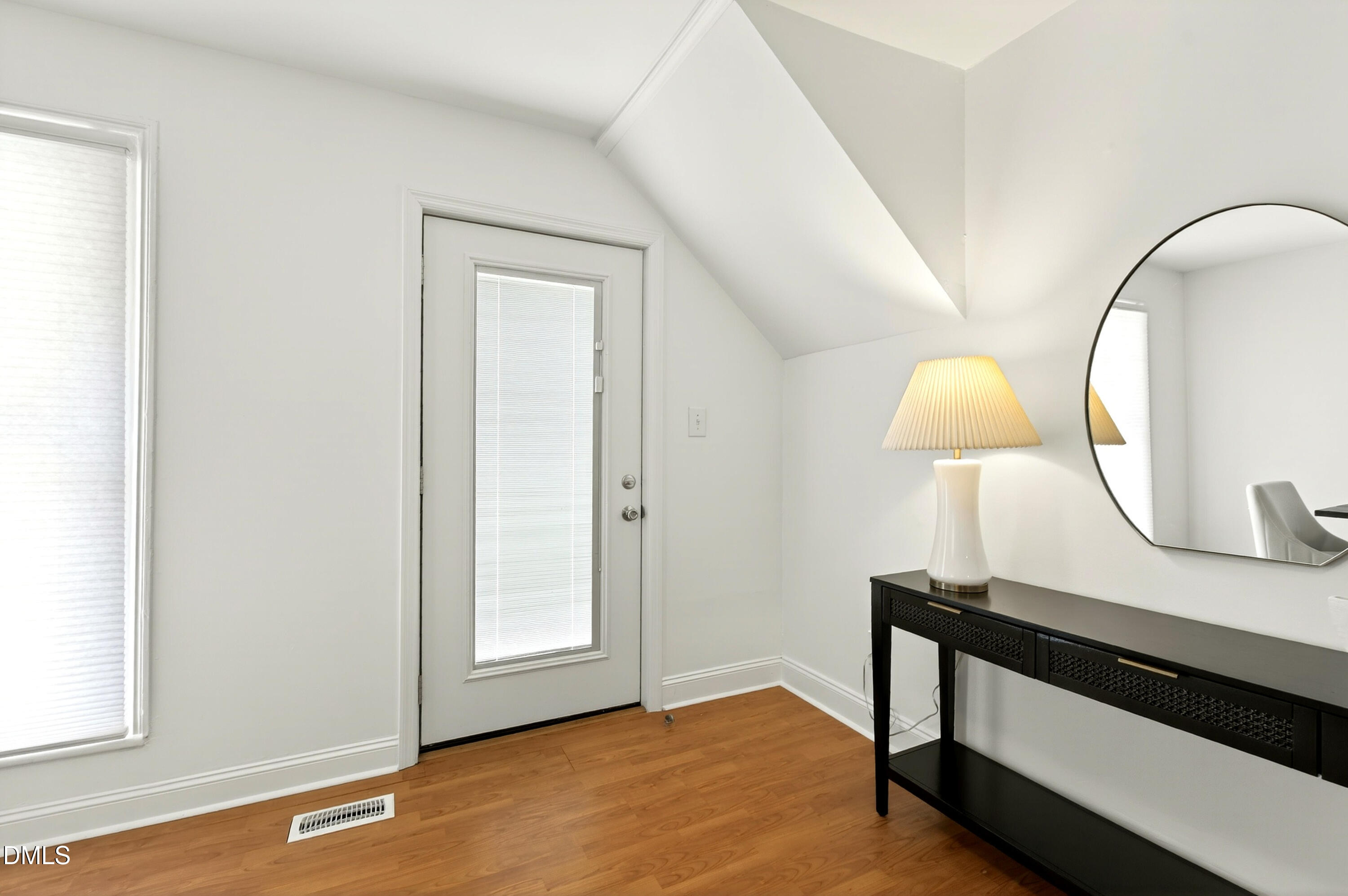 913 Washington Street Durham, NC 27701 - Photo 2 of 37 a view of front door and wooden floor