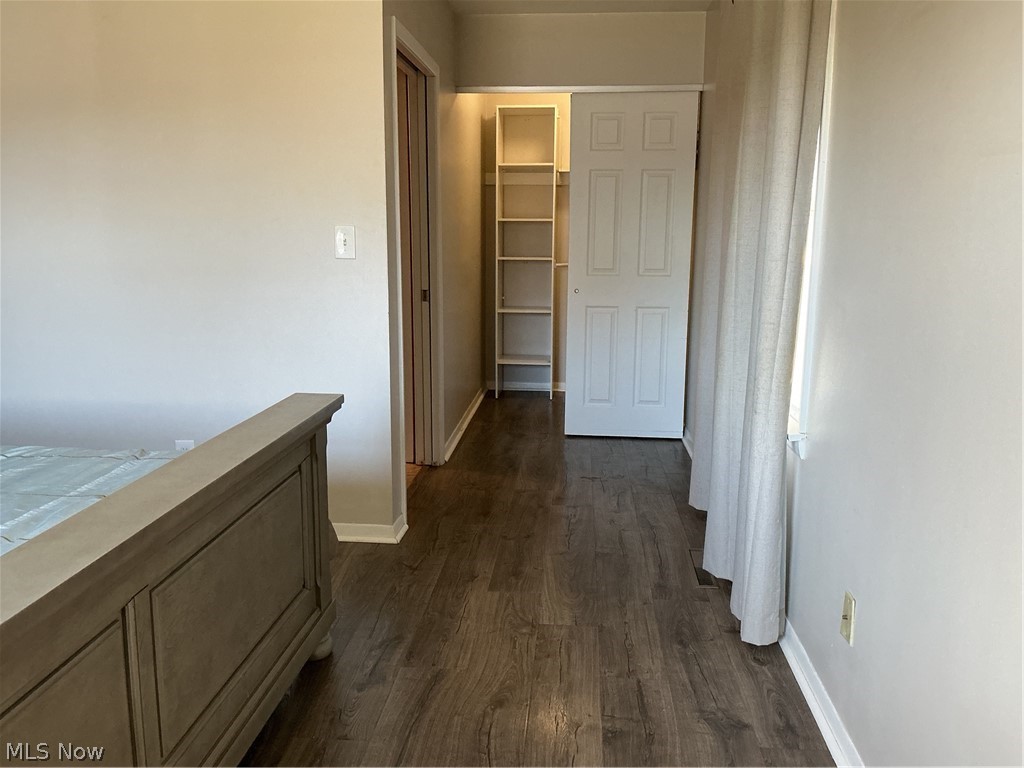 1850 Merle Road Salem, OH 44460 - Photo 13 of 35 Corridor with dark wood-style floors and baseboards