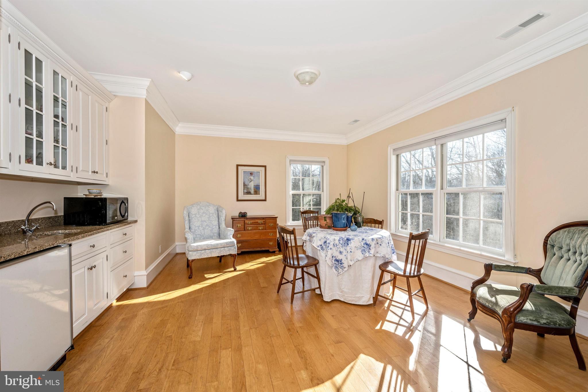 11340 Albermyrtle Road Potomac, MD 20854 - Photo 19 of 42 Sitting Room with wet bar