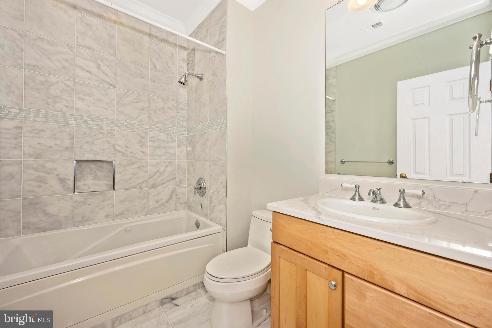 11340 Albermyrtle Road Potomac, MD 20854 - Photo 23 of 42 2nd bedroom full bathnewly remodeled