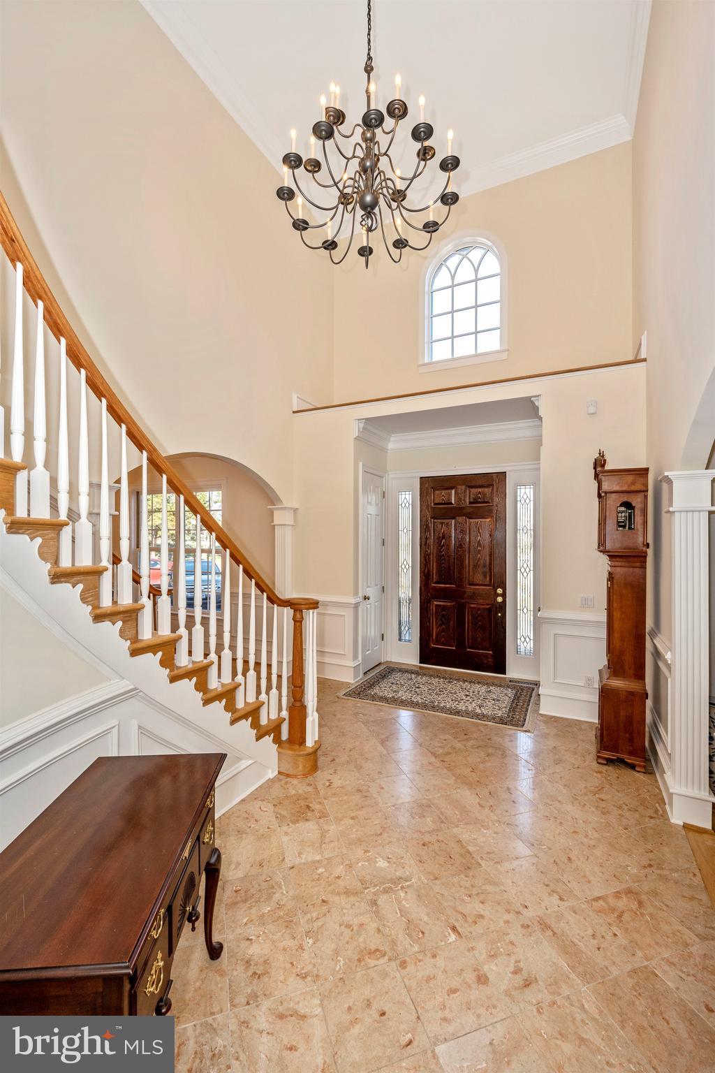 11340 Albermyrtle Road Potomac, MD 20854 - Photo 9 of 42 Front Hall Chandelier with Chandelier hoist
