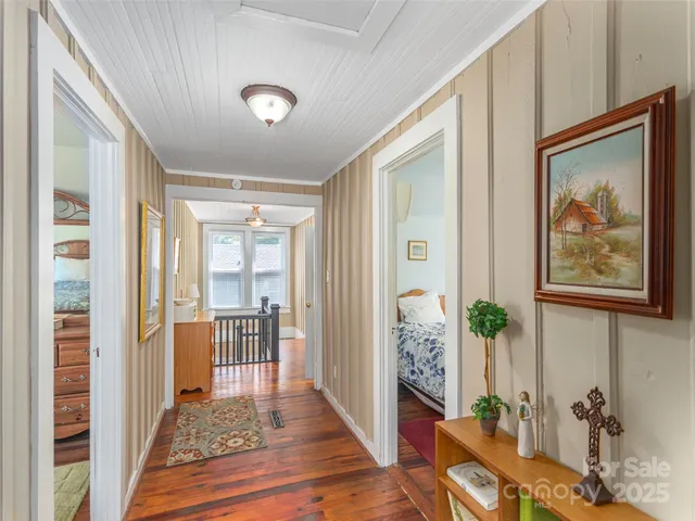 a view of a hallway with a livingroom